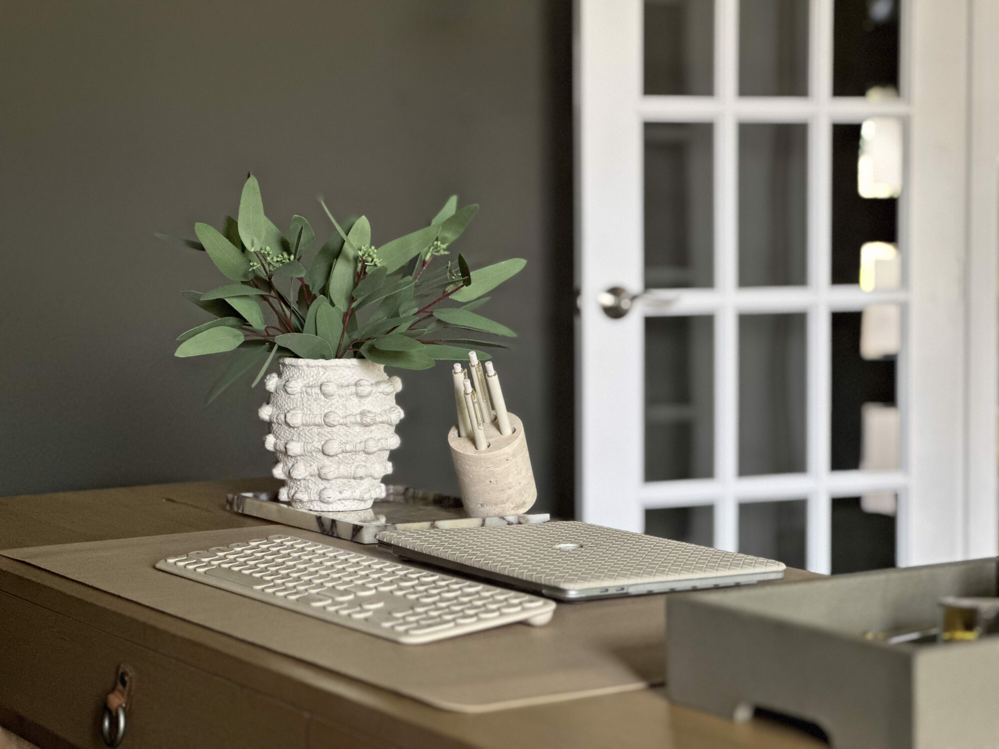 tips for creating a functional and comfortable home office | home, home office, home office styling, textured vase, home decor, laptop, keyboard