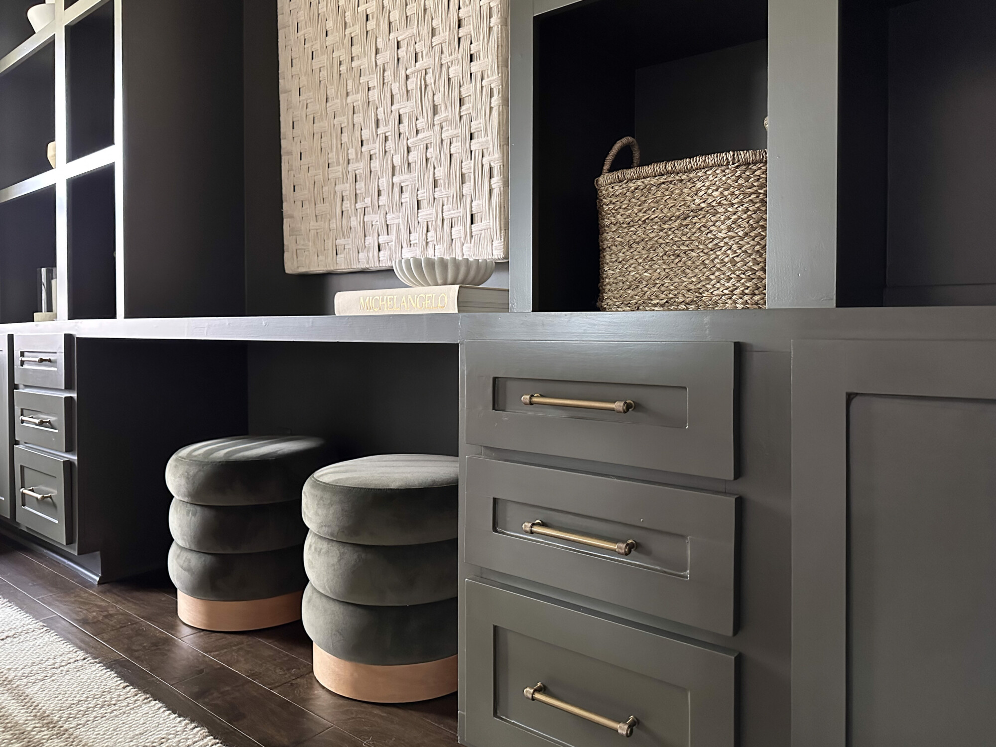 tips for creating a functional and comfortable home office | home, home office, home office styling, seating, functional, ottoman, storage, cabinets, wall art, moody office