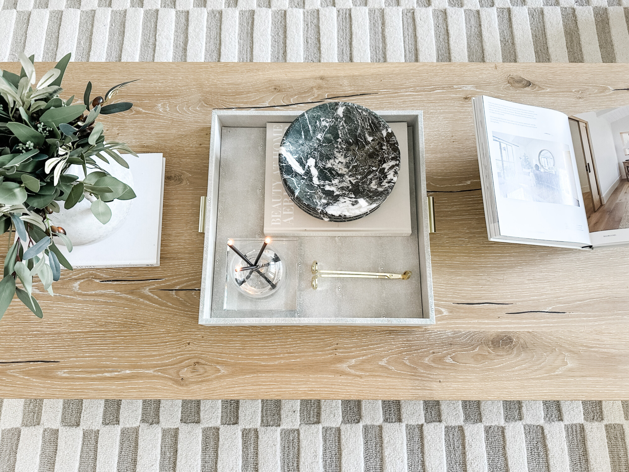 Tips for creating an elevated coffee table | coffee table decor, coffee table, coffee table styling, table decor, table decor styling, table styling, living room, living room decor, living room finds