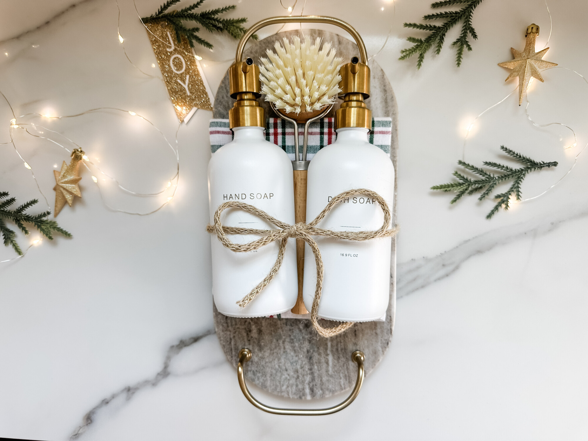 thoughtful and affordable diy host gifts under $35 | host gifts, diy gifts, gift ideas, handmade gift, gift ideas, soap dispenser, holiday towel, gray marble tray, gift tags, seasonal decor, seasonal kitchen