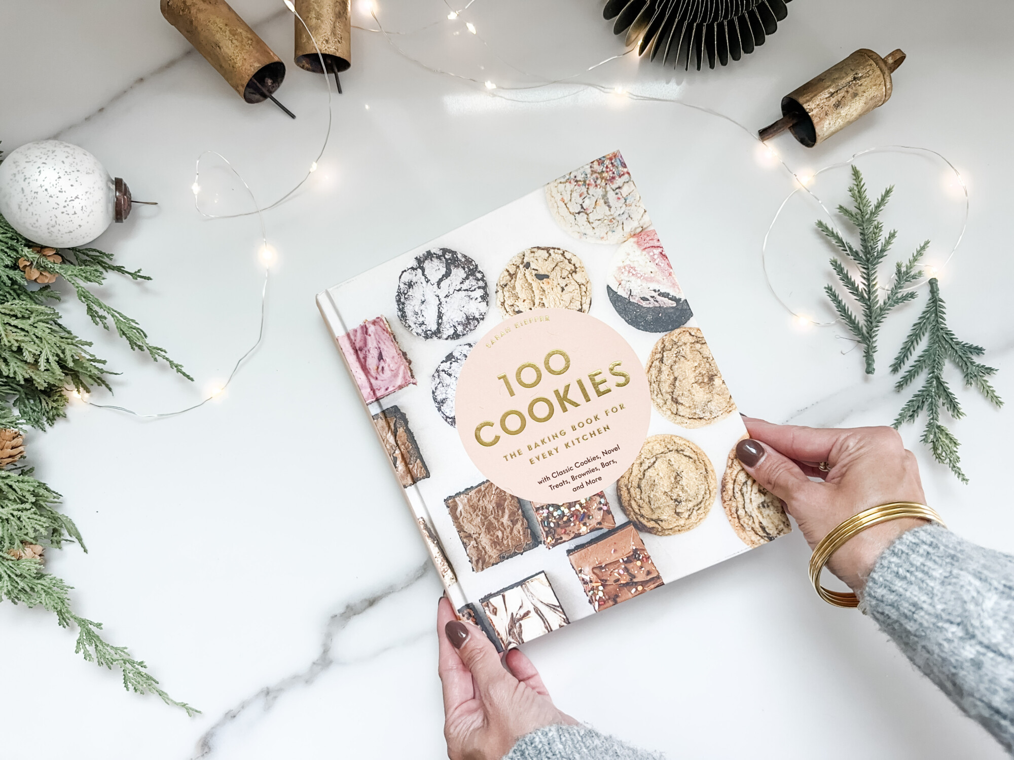 thoughtful and affordable diy host gifts under $35 | host gifts, diy gifts, gift ideas, handmade gift, gift ideas, cookie cookbook, vintage bells, string lights, 100 cookies, cookie recipe, baking 