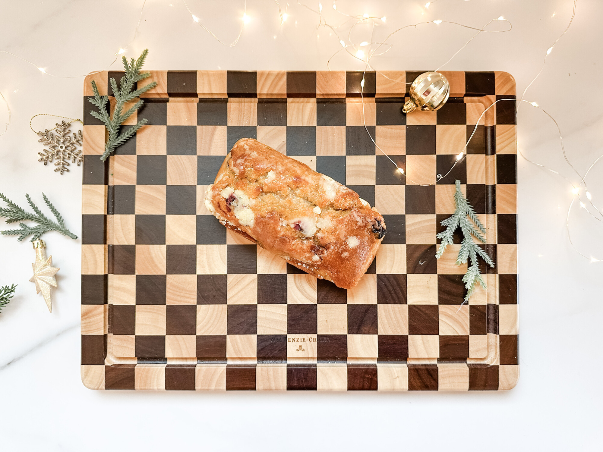thoughtful and affordable diy host gifts under $35 | host gifts, diy gifts, gift ideas, handmade gift, gift ideas, holiday loaf, bread loaf, cutting board, edible gift, homemade bread, christmas ornament