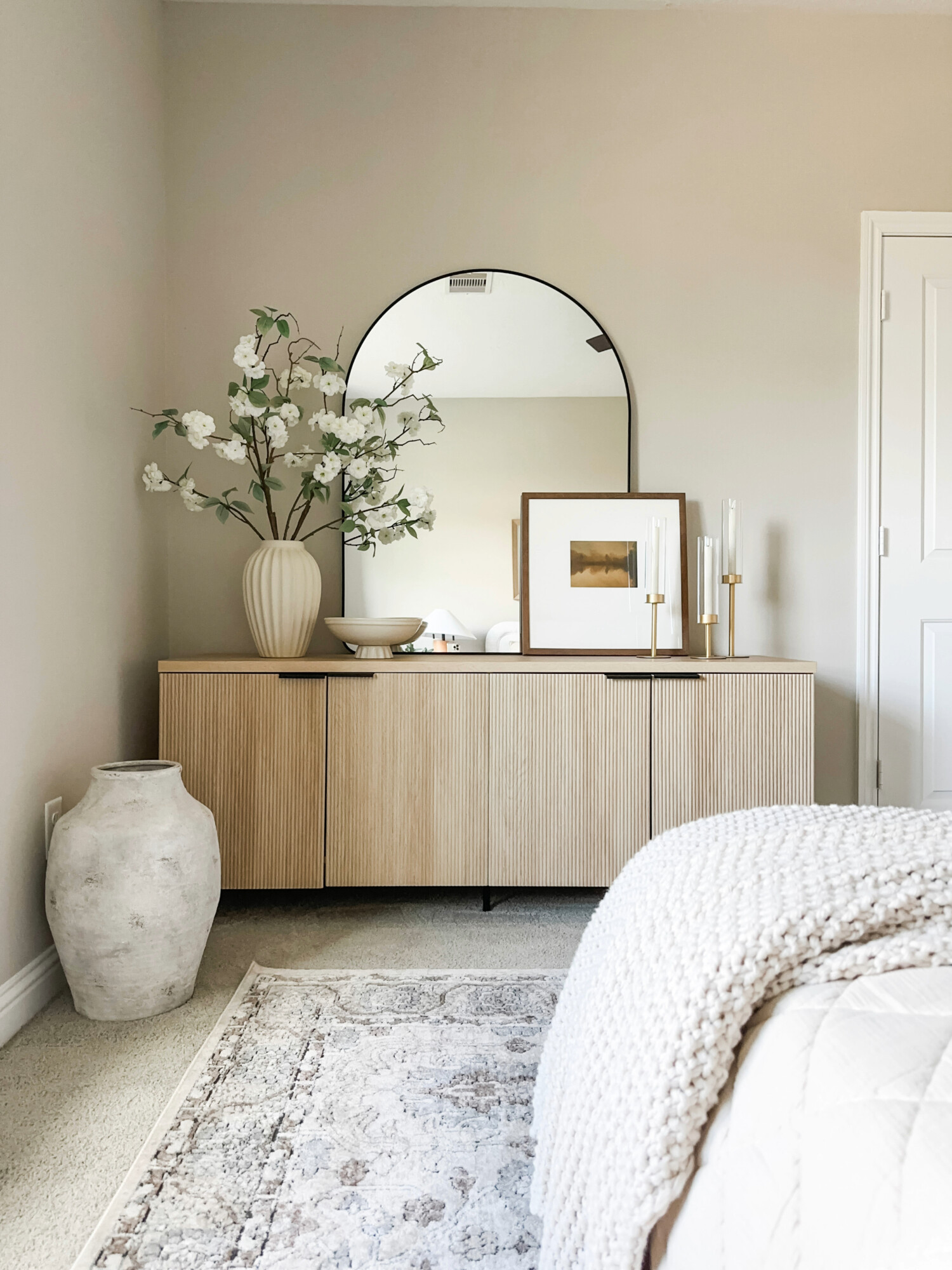 beige cabinet in guest bedroom