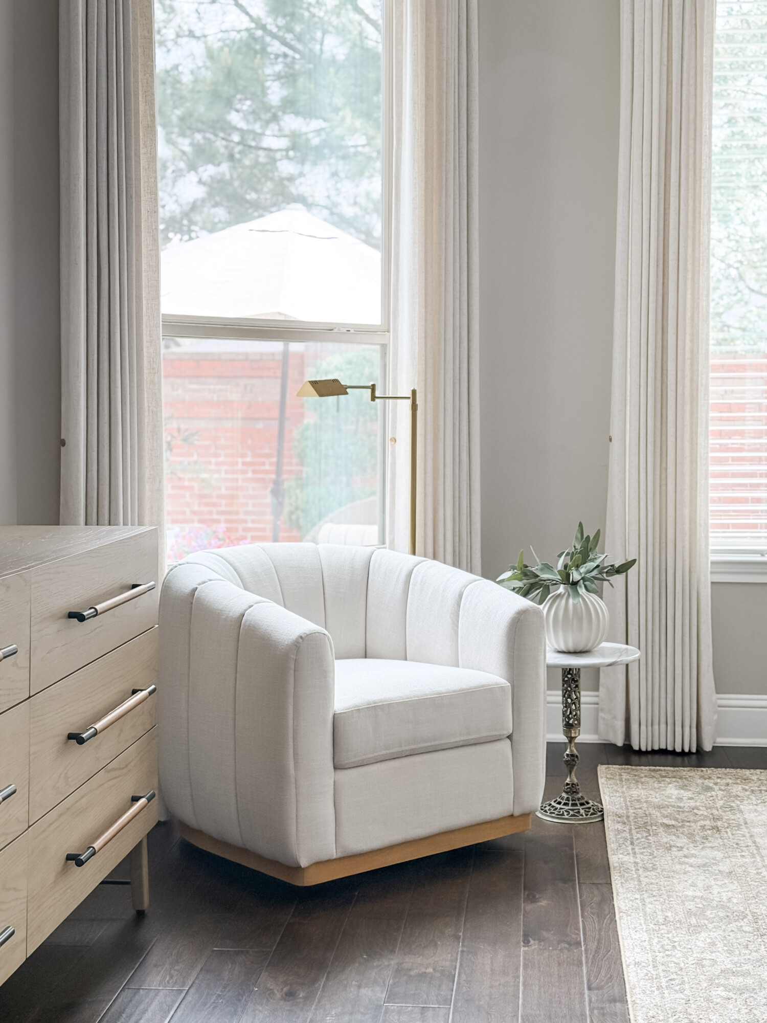 bedroom corner with accent chair